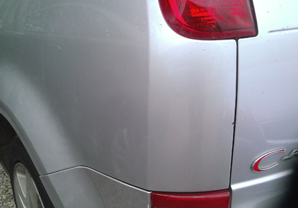 De-Dent Paintless Dent Removal